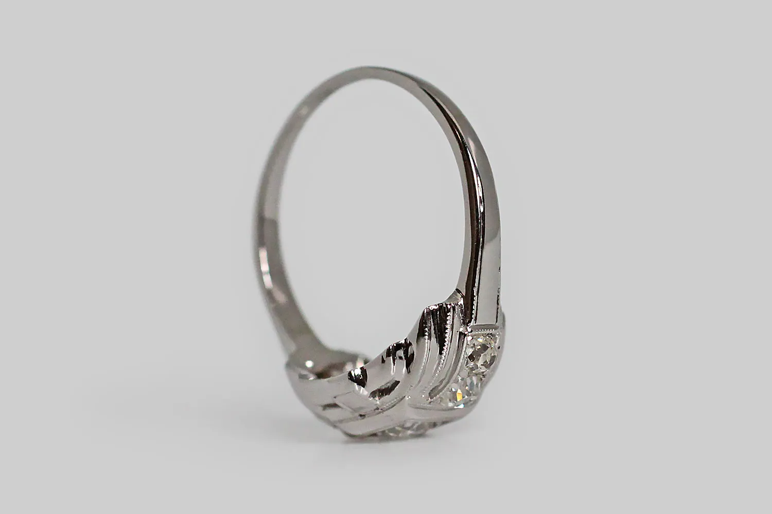 Art Deco Era Five Diamond Temple Engagement Ring in Platinum