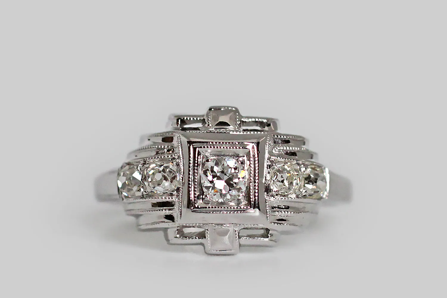 Art Deco Era Five Diamond Temple Engagement Ring in Platinum