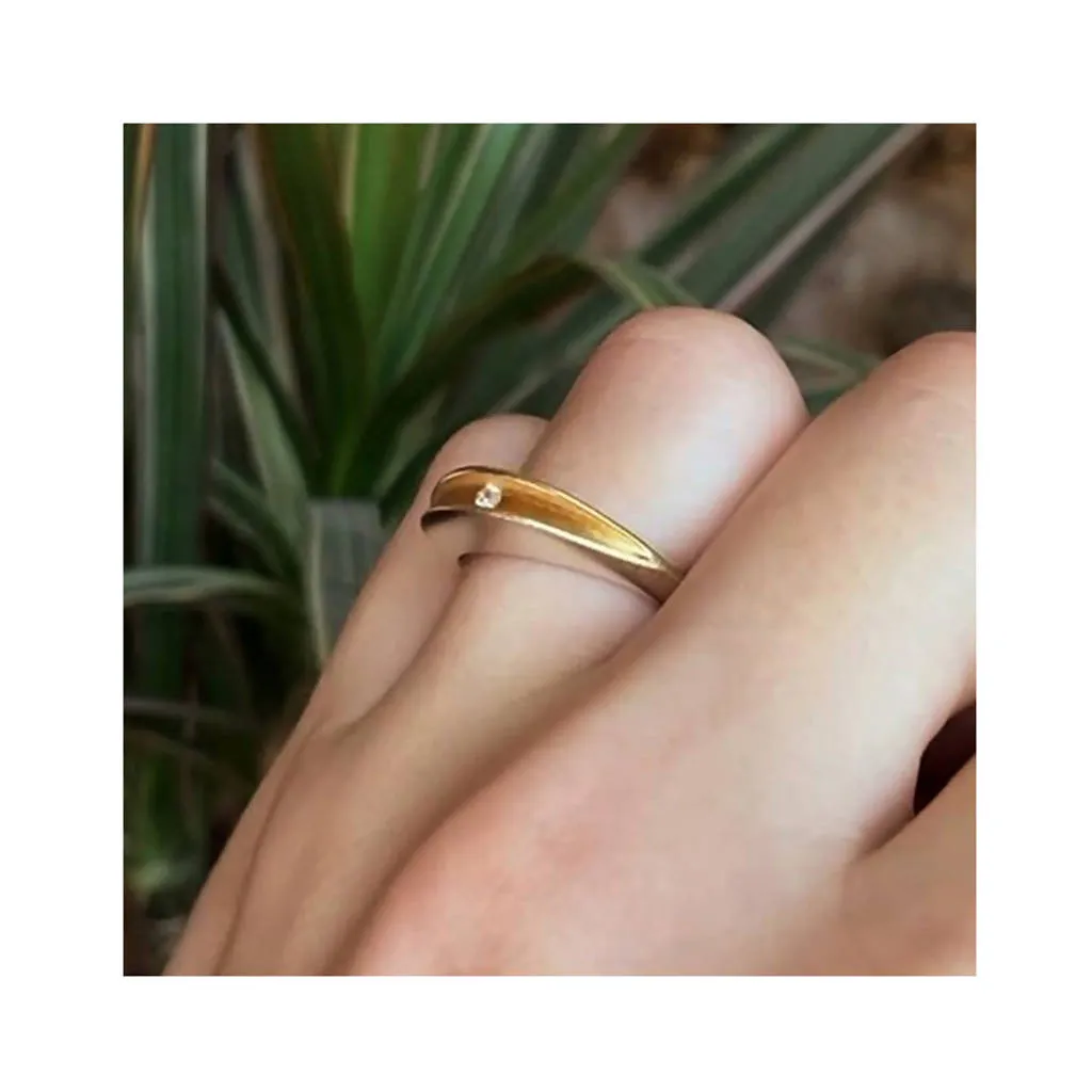Partially split silver shell ring with 3pt diamond and 22K gold plated interior
