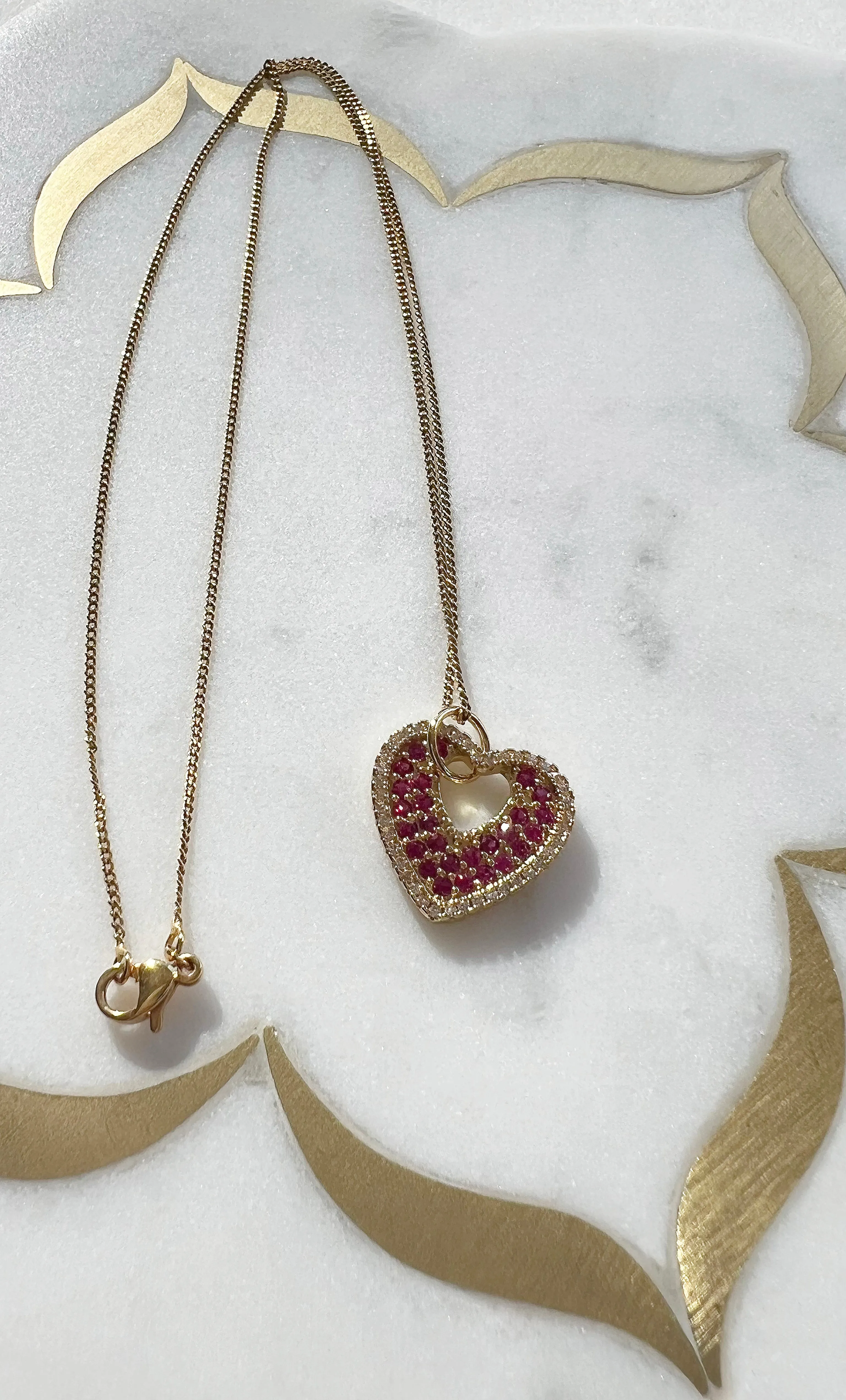 The Tunik Roaming Hearts Necklace